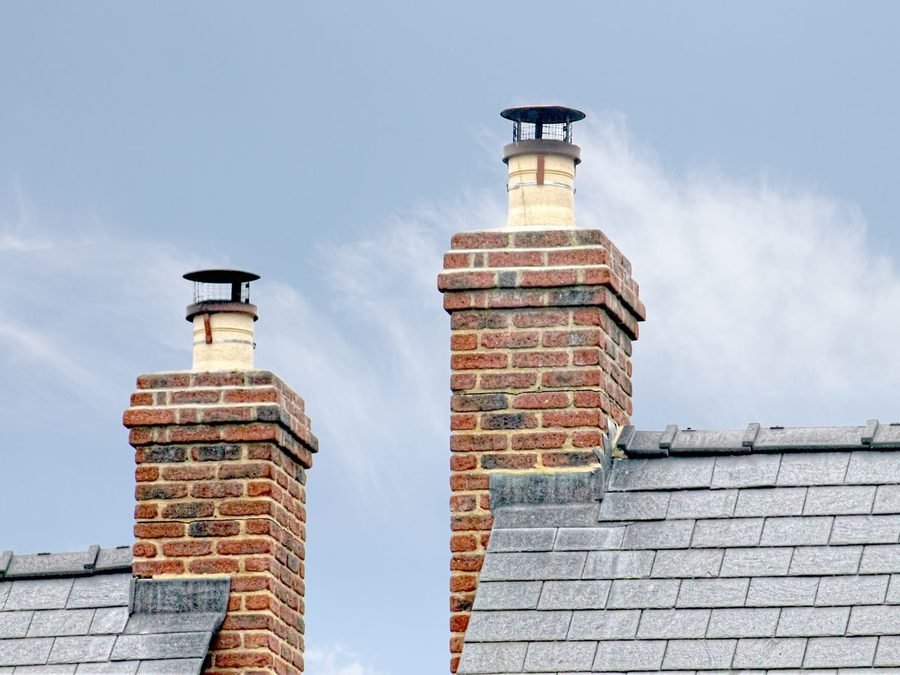 Brick chimneys on a slate roof