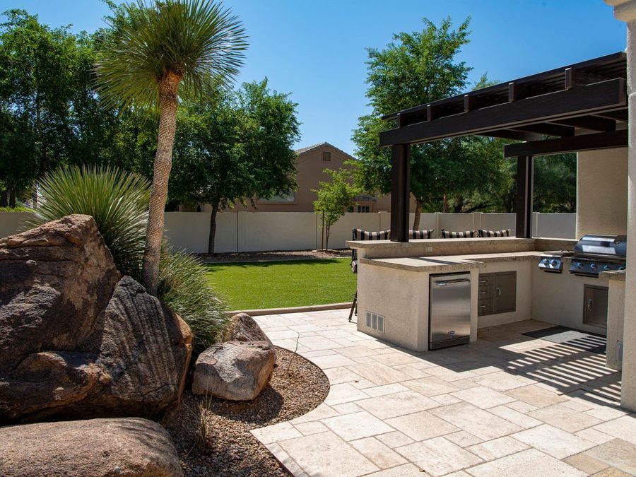 Paver patio with outdoor kitchen