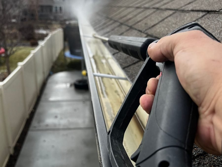 Pressure washing an exterior surface